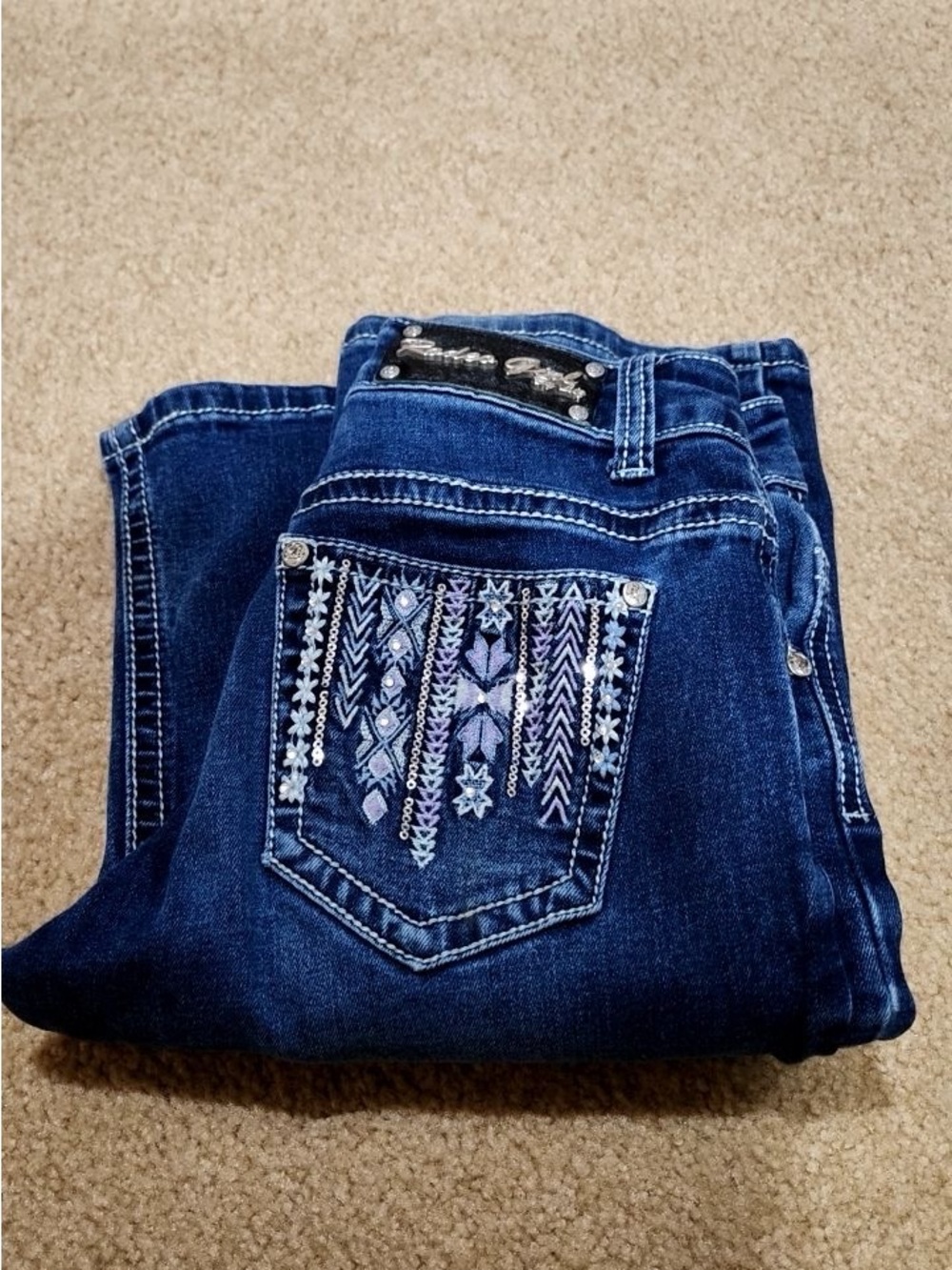 2 pairs of girls jeans 
Girls Dark Blue Embroidered Denim Jeans